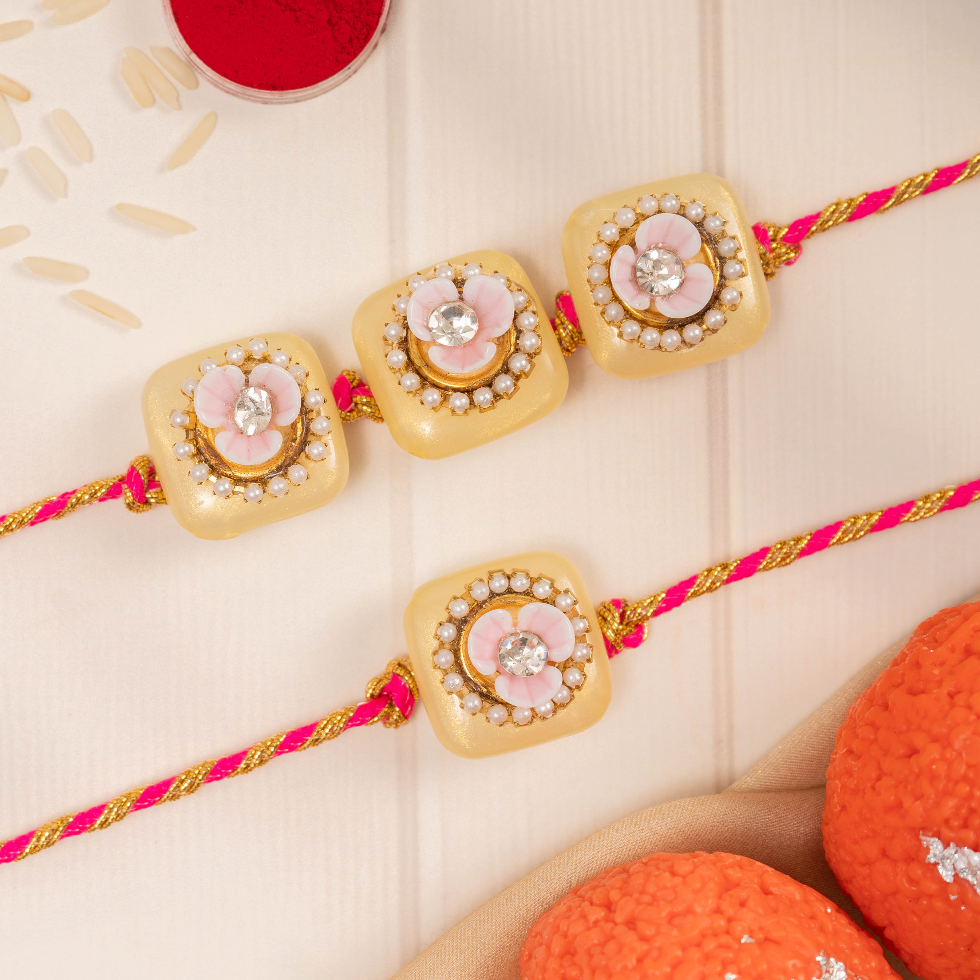 Pink and Gold Lumba Rakhi Set