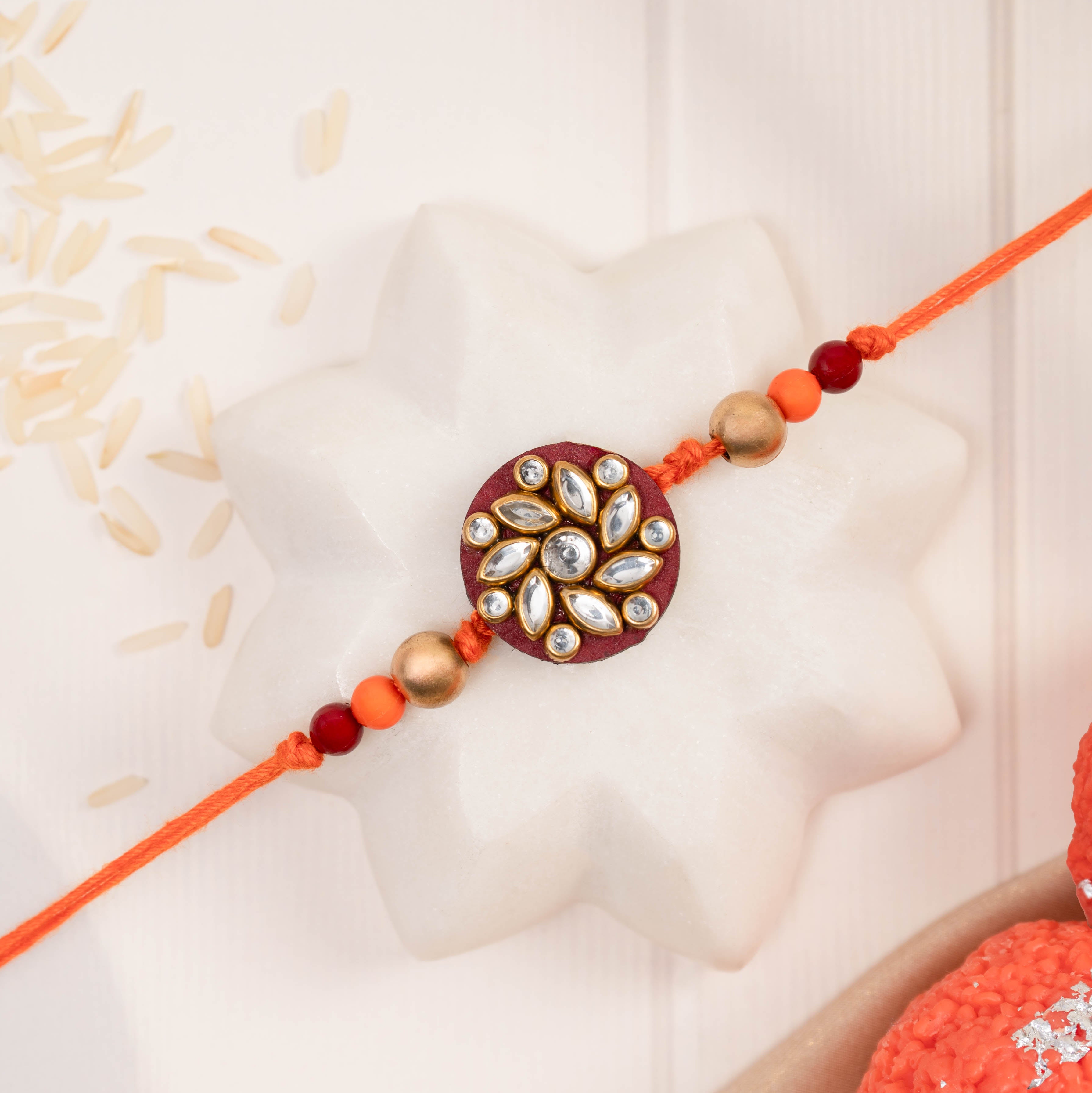 Traditional Beads and Kundan Rakhi